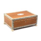 An early 19th Century Anglo-Indian ivory and sandalwood sewing box, Vizagapatam, of rectangular form