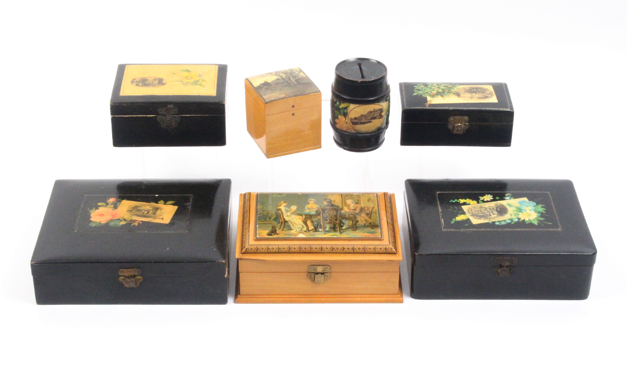 Mauchline ware - seven pieces comprising two black ground rectangular boxes (flowers - Stone Bow