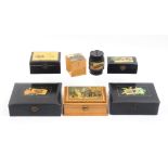 Mauchline ware - seven pieces comprising two black ground rectangular boxes (flowers - Stone Bow