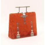 A late Victorian sewing companion in red plush with white metal fittings and of bag form, triangular