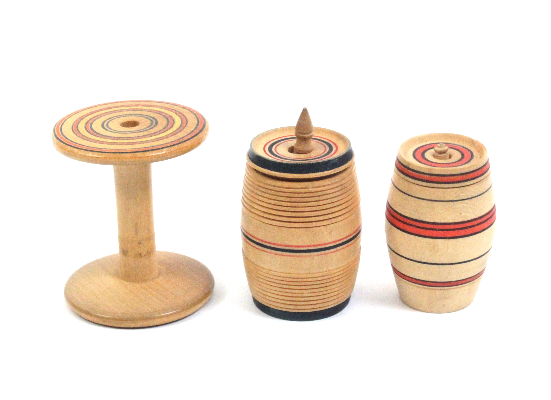 Three-line painted whitewood Tunbridge ware sewing accessories comprising a reel, 4cm, and two