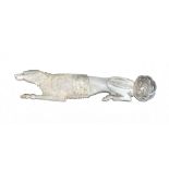 A fine Palais Royal mother of pearl carved needle case in the form of a poodle lying down, paws