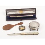 A mixed lot comprising a miniature mahogany hand mirror, 11cm, an oval silver ring box, lid rim