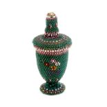 A good beadwork covered thimble/needle case of urn form, bone core, covered in predominantly green