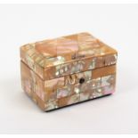 A mother of pearl needle packet box with geometric decoration, the canted lid inscribed 'Paris',