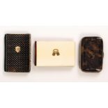 Two notelets and a purse, comprising a tortoiseshell and gold star inlaid example, 10 x 6.5cm,