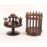 A Victorian rosewood reel stand and a wool ball cage, the reel stand rotating and with four reel