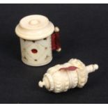 Two 19th Century ivory tape measures comprising a cylinder example with roundel top, pierced