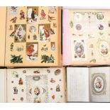 Victorian and later scraps, cards and prints neatly arranged in four albums, the smallest in leather