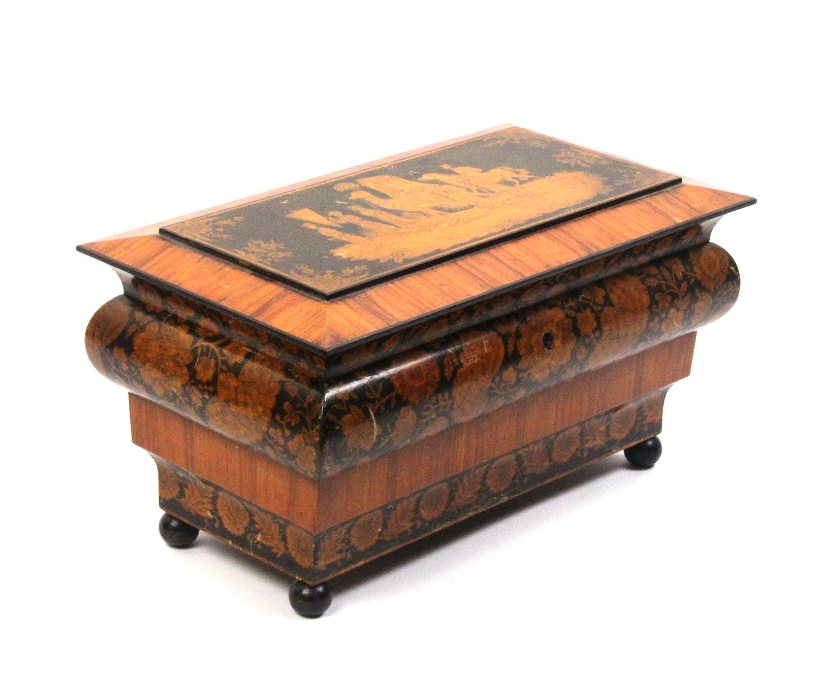 A fine Regency penwork tea caddy of ogee rectangular form, the stepped sides with twin bands of
