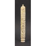 A 19th Century Chinese ivory netting case of tapering cylinder form carved with dragon,