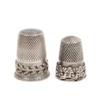 Two French silver thimbles both with decorative borders (2)