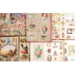 Victorian and later scraps, cards and prints contained in five albums, together with a linen panel