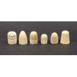 Six 19th Century bone or ivory thimbles one with copper gilt rim (6)