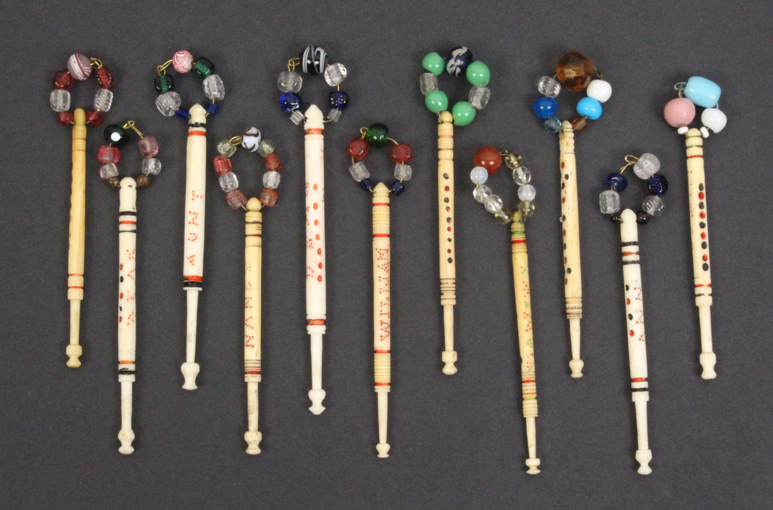 Nine silver Royal commemorative lace bobbins mostly by Robin K. How and from limited editions of