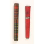 Two needle cases comprising a Tartan ware (M'Beth) cylinder example, 8.7cm and a Regency red leather