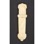 A Regency carved ivory needle case in the form of a quiver carved with masks, bound reeds, bow and