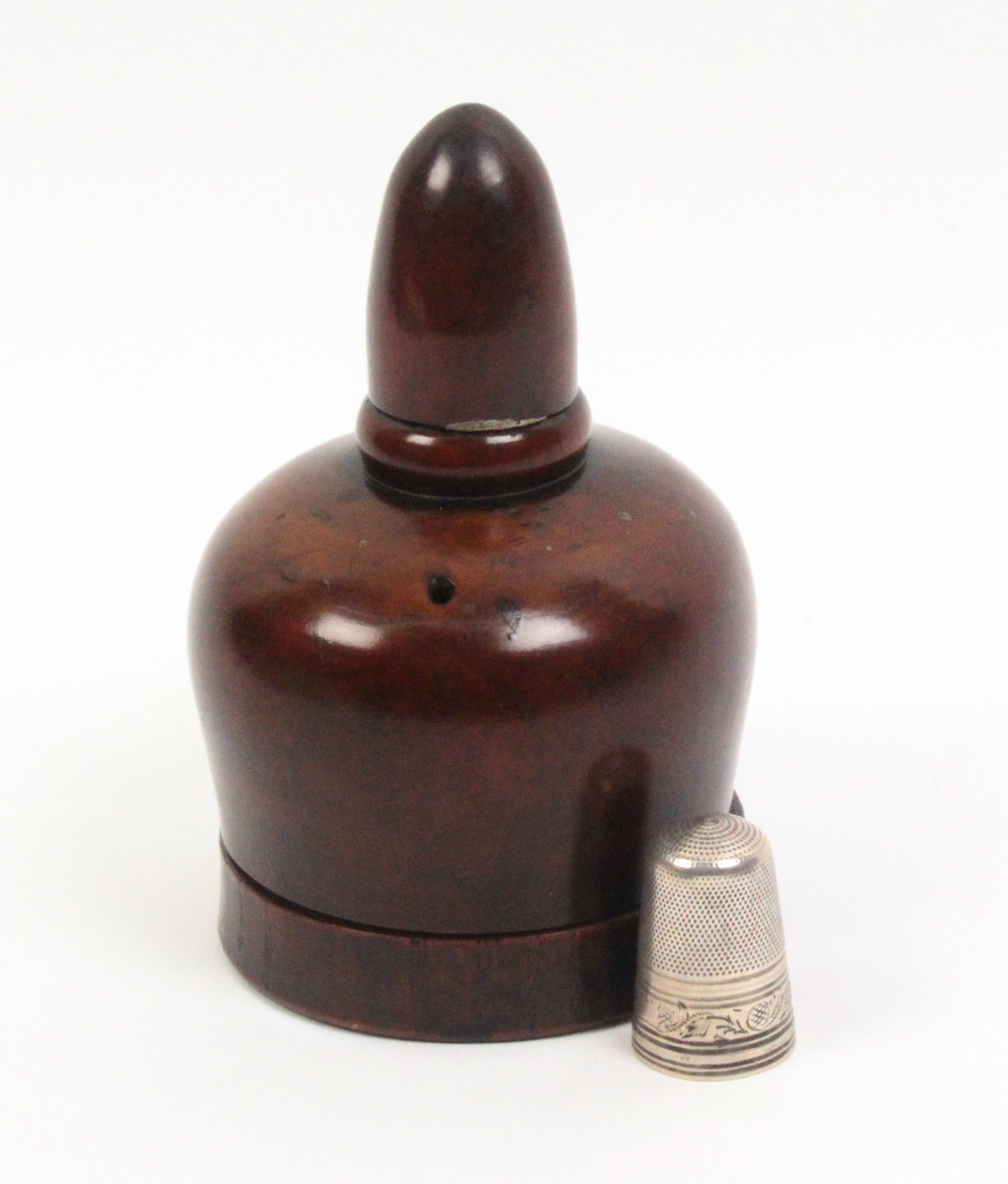 An attractive 19th Century treen thimble/thread case of baluster form with acorn top, 10cm high,