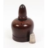 An attractive 19th Century treen thimble/thread case of baluster form with acorn top, 10cm high,
