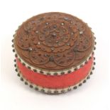 A good carved boxwood and cloutŽ work disc form pin cushion each side carved as a flowerhead, red