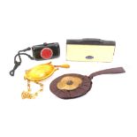 Four vintage compacts and purses comprising a black plastic example in the Chinese style, cord