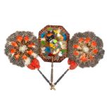 Three feather decorated early 19th Century face screens comprising a pair of oval form decorated