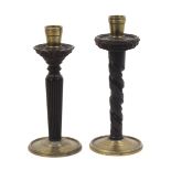 A 'pair' of ornamentally engine turned hardwood candlesticks, the stems of variant design, brass