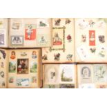 Victorian and later scraps, cards and prints contained in four albums, largest 37 x 28cm (4)