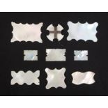 Nine mother of pearl silk winders including three rectangular multiple examples and three Chinese