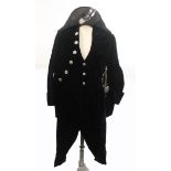 A Victorian court suit comprising black velvet tail coat, waistcoat and breeches all with cut