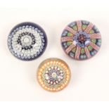 Three millefiori glass dome form paperweights, largest 8cm (3)