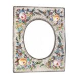 A late 19th Century Italian micro mosaic Italian mirror frame the oval plate within floral