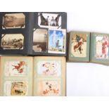 Three albums of Victorian and Edwardian postcards comprising a part filled album of greeting