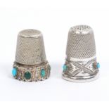 Two continental silver thimbles both with decorative friezes set with turquoise coloured stones (2)