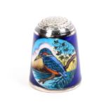 A silver and enamel thimble by Peter Swingler the blue enamel ground with two ovals each of a