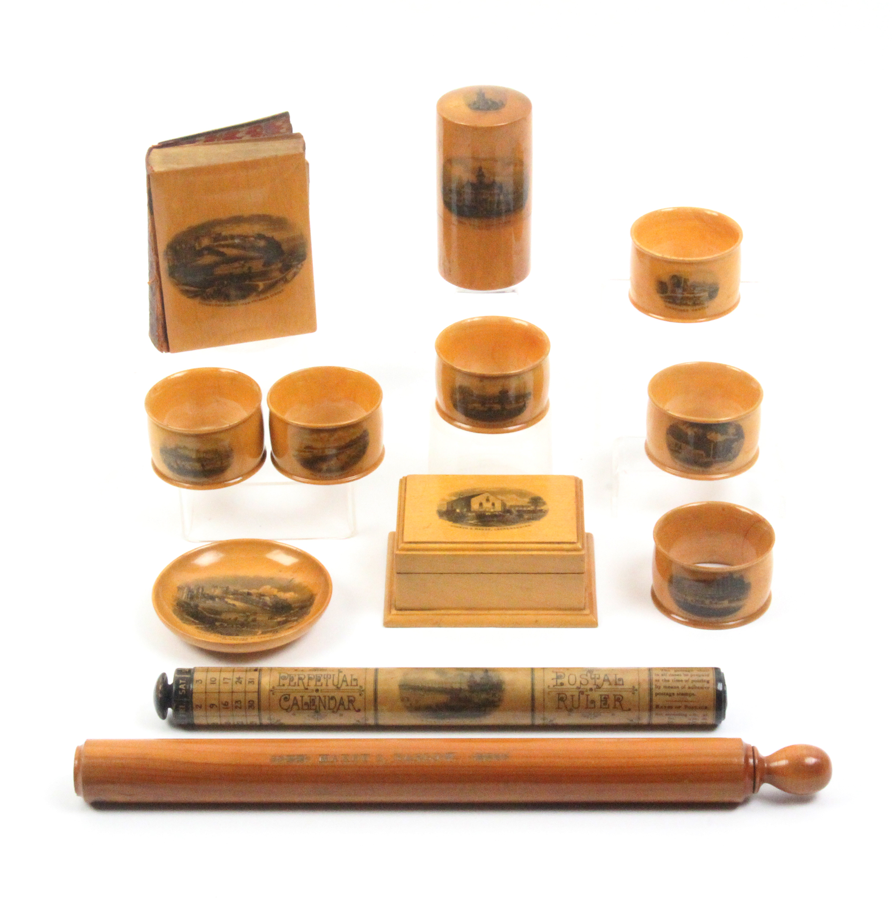 Mauchline ware - twelve pieces comprising a set of six numbered napkin rings (Pier Hastings/The