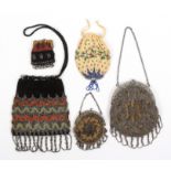 Five small format 19th Century beadwork purses comprising two examples predominantly in cut steel