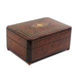 A French amboyna and inlaid musical sewing box, circa 1870, of rectangular form with canted corners,