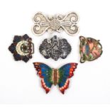 Various buckles comprising a Russian niello example with dagger catch, converted to a brooch, 6.2cm,