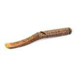 An early 19th Century chip carved fruitwood knitting stick, probably Welsh, inscribed 'H + R', 16cm