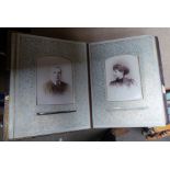 A smaller Photograph Album and contents of portrait photographs.