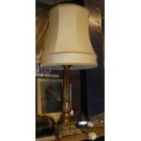A brass Table Lamp with classical column and square base, complete with shade.