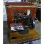 A Child's Sewing Machine by E L Grain of Nottingham, boxed.