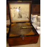 A late 19th century Kalliope table top Musical Disc Player, fitted steel comb movement, with winding