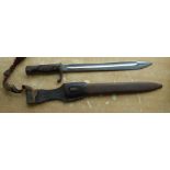 A German Mauser World War One Bayonet and Scabbard with bouillon knot.