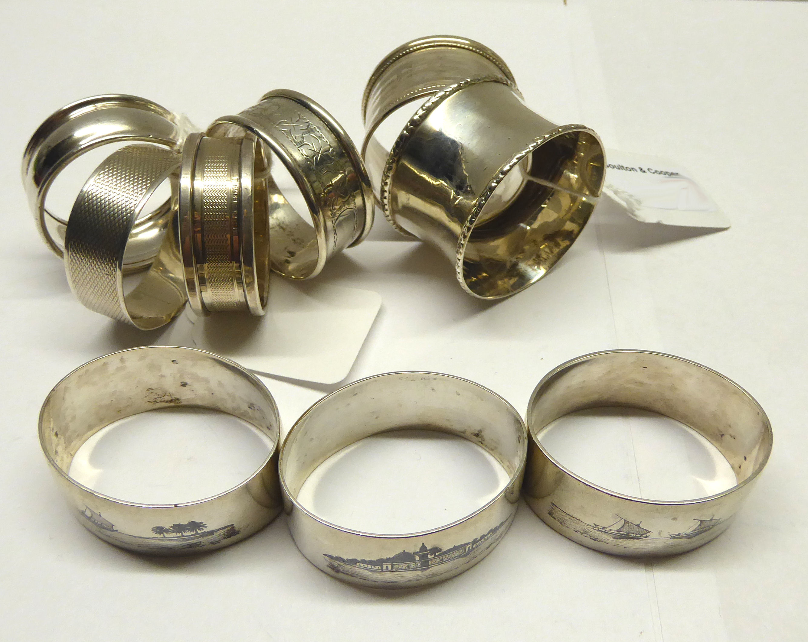 Six various silver Serviette Rings, and three North African Serviette Rings.