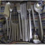 A suite of Viners Studio Cutlery by Gerald Benney for six covers, comprising soup spoons, dessert