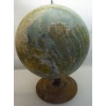A Philips 14" Terrestrial Globe on a turned wooden stand.