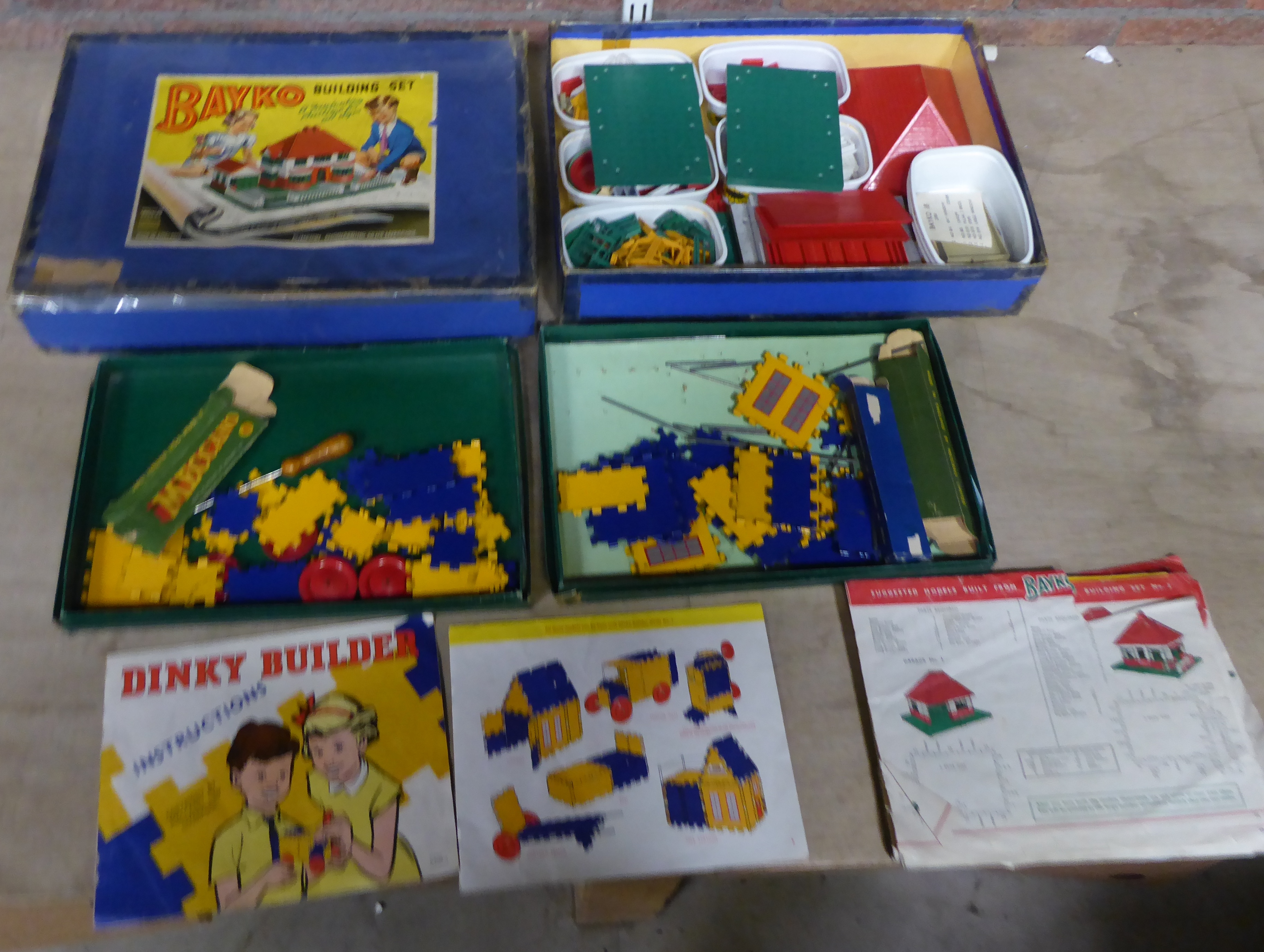 A Bayko Building Set, boxed, and two Dinky Builder Boxes and contents.