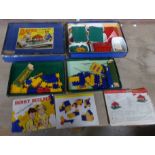 A Bayko Building Set, boxed, and two Dinky Builder Boxes and contents.